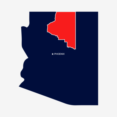 Blue outline of the State of Arizona with a red outline showing Coconino county.