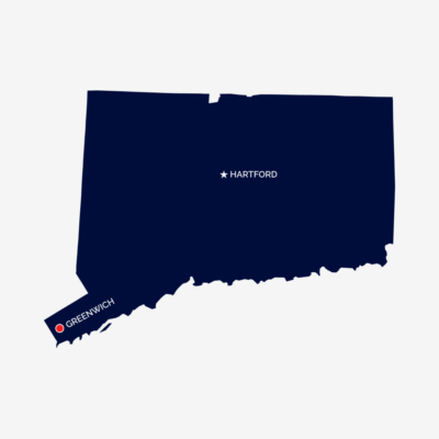 Blue outline of the State of Connecticut with a red outline showing the town of Greenwich.