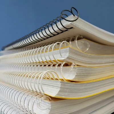 stack of spiral notebooks